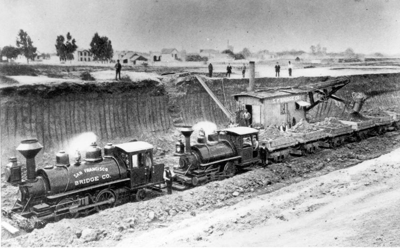 Excavating the tidal canal, ca. 1890.  Devised by the Army Corps of Engineers, this one-mile-long waterway linked the estuary to San Leandro Bay.